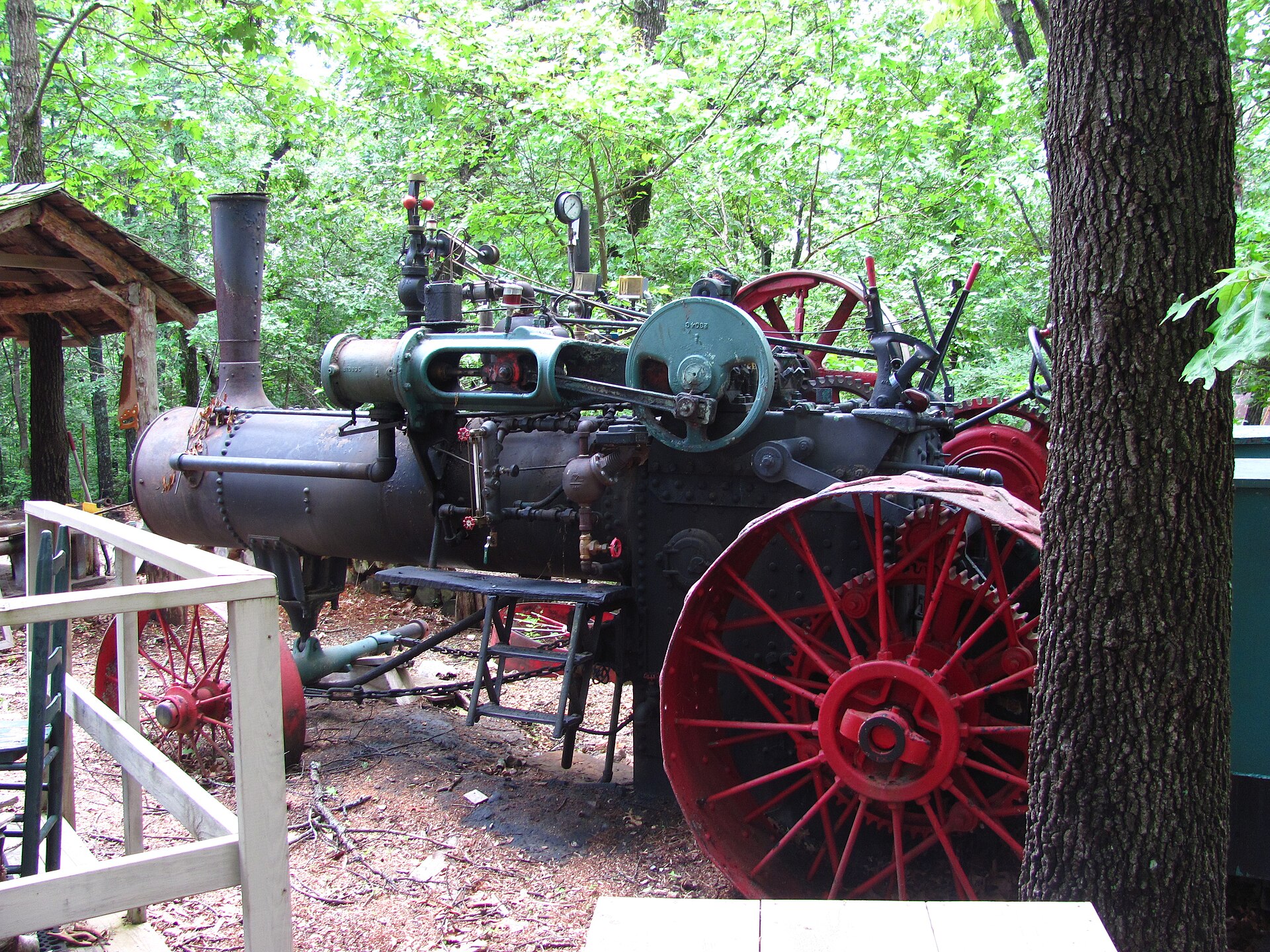 Historic tractor and Ozark scenery at Silver Dollar City